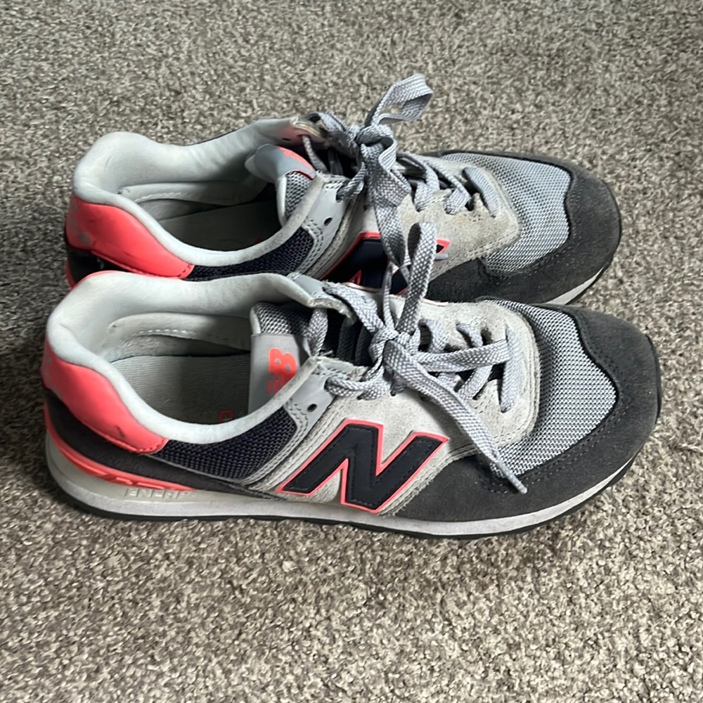 Grey and pink new balance 574s